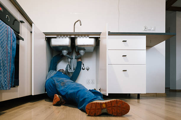 Professional Drain Cleaning technician working in Rueter, MO